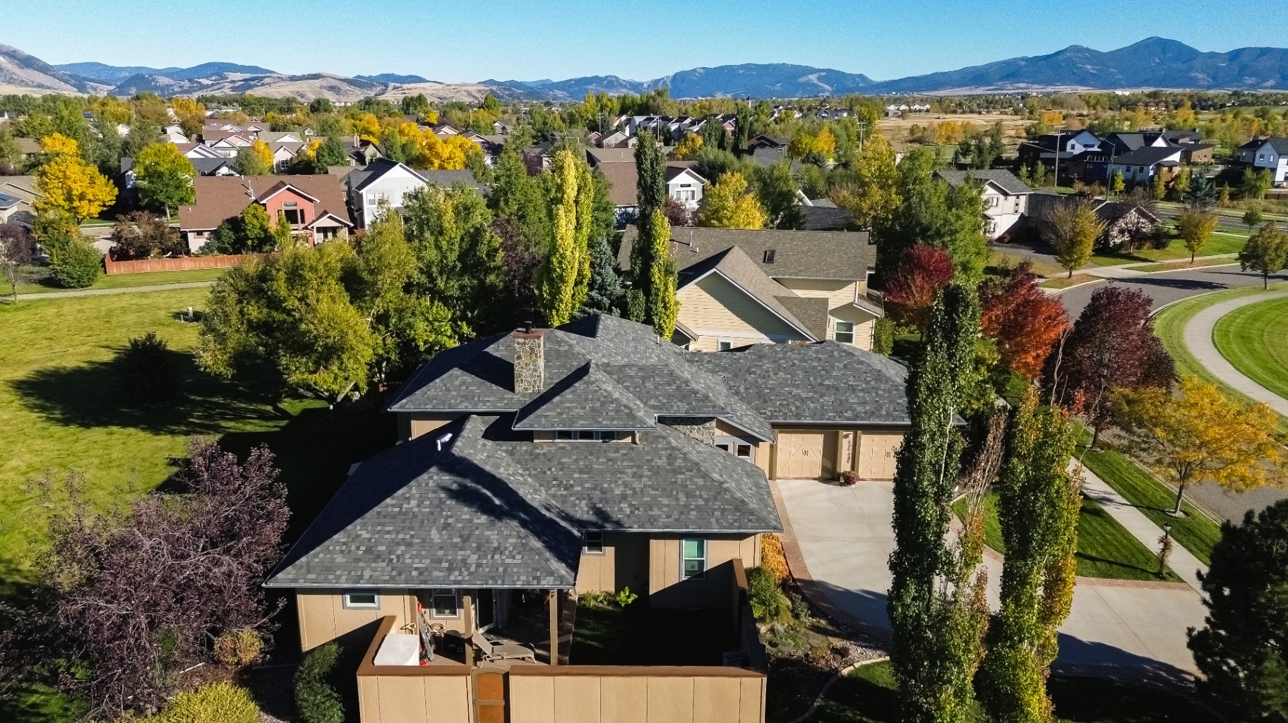 Side view across the property with fall colors